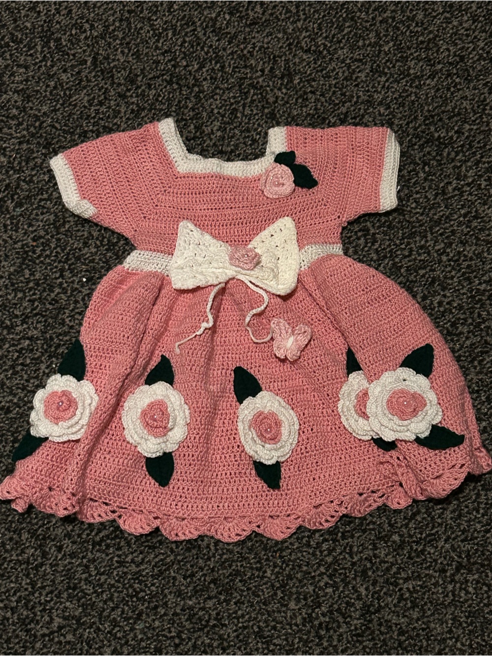 Handmade Pink Crocheted Baby Romper with White Flowers